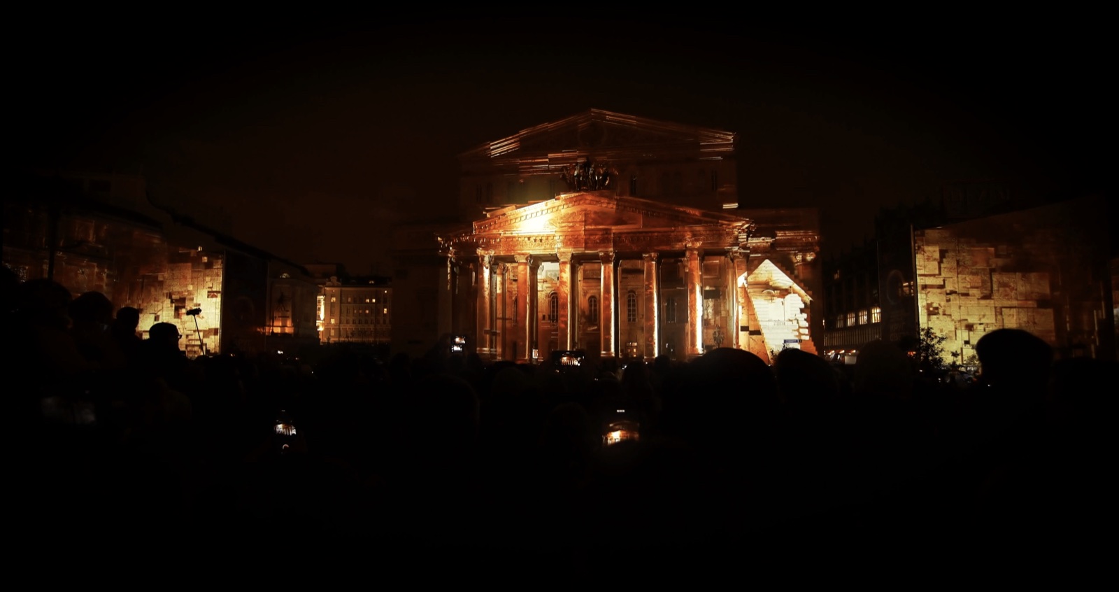 The columned façade of the Bolshoi Theatre in Moscow transformed by a 3D projection mapping of shifting architecture