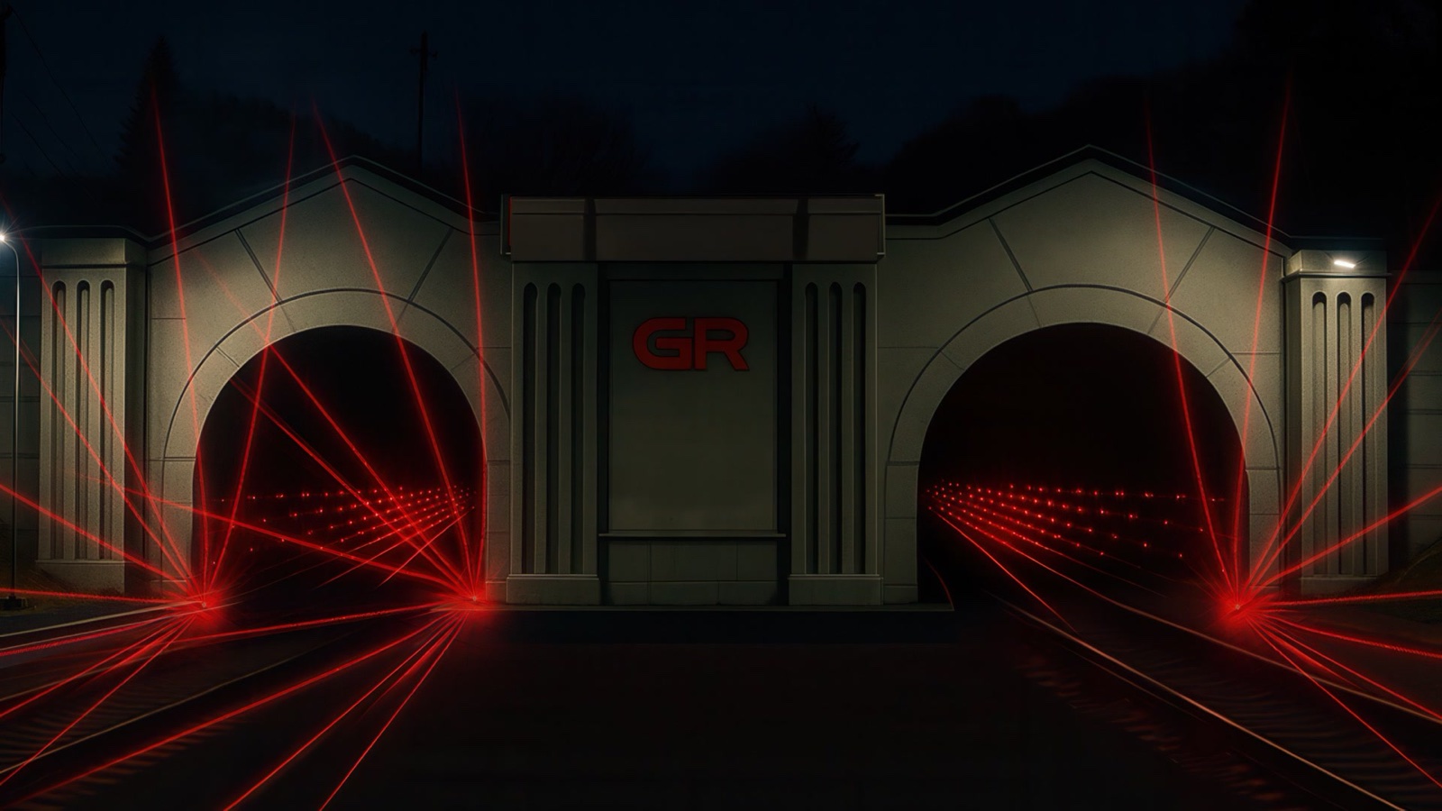A stone railway tunnel portal in Tbilisi covered in a projection mapping of coloured tiles, with a hologram of light appearing in the tunnel mouth