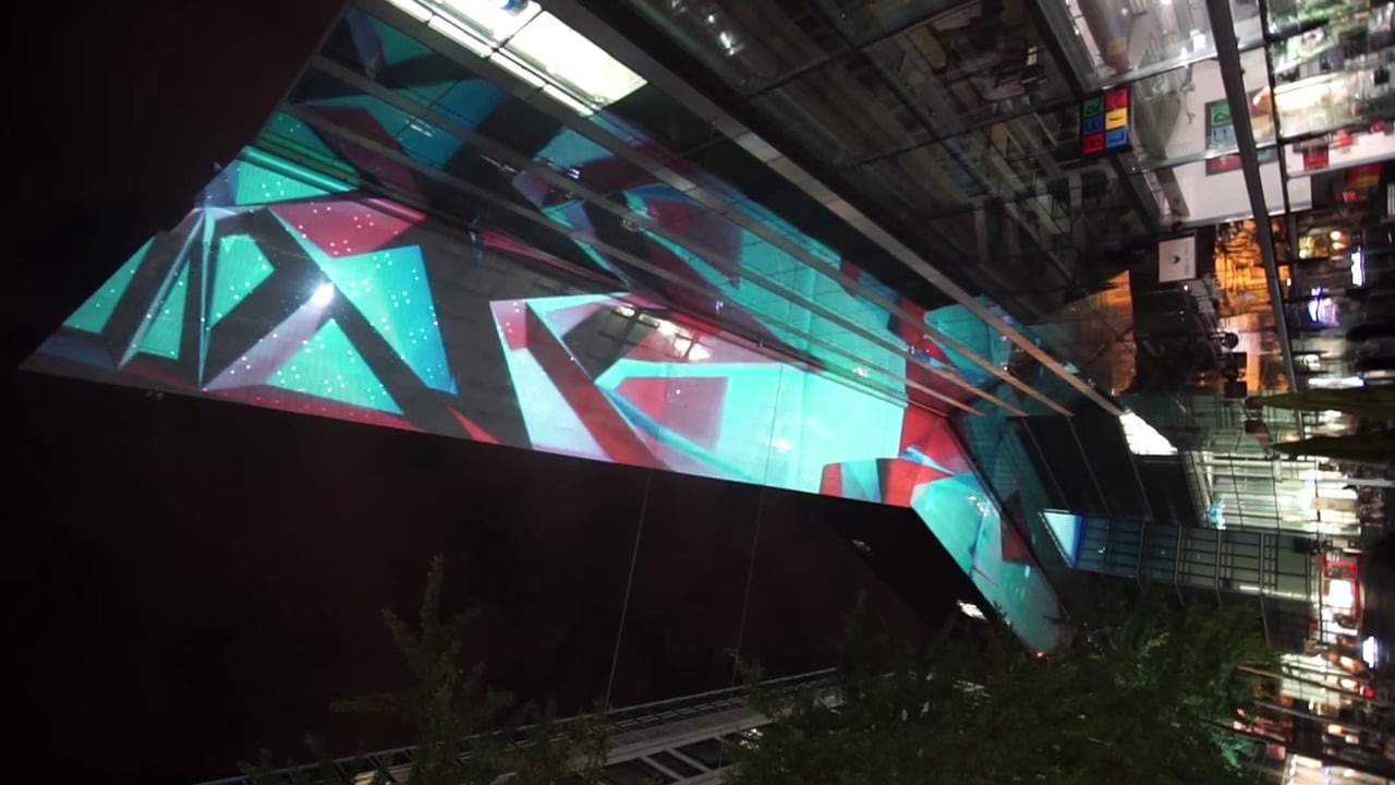 The glass ceiling of the Neues Kranzler Eck business centre in Berlin animated with geometric projection mapping