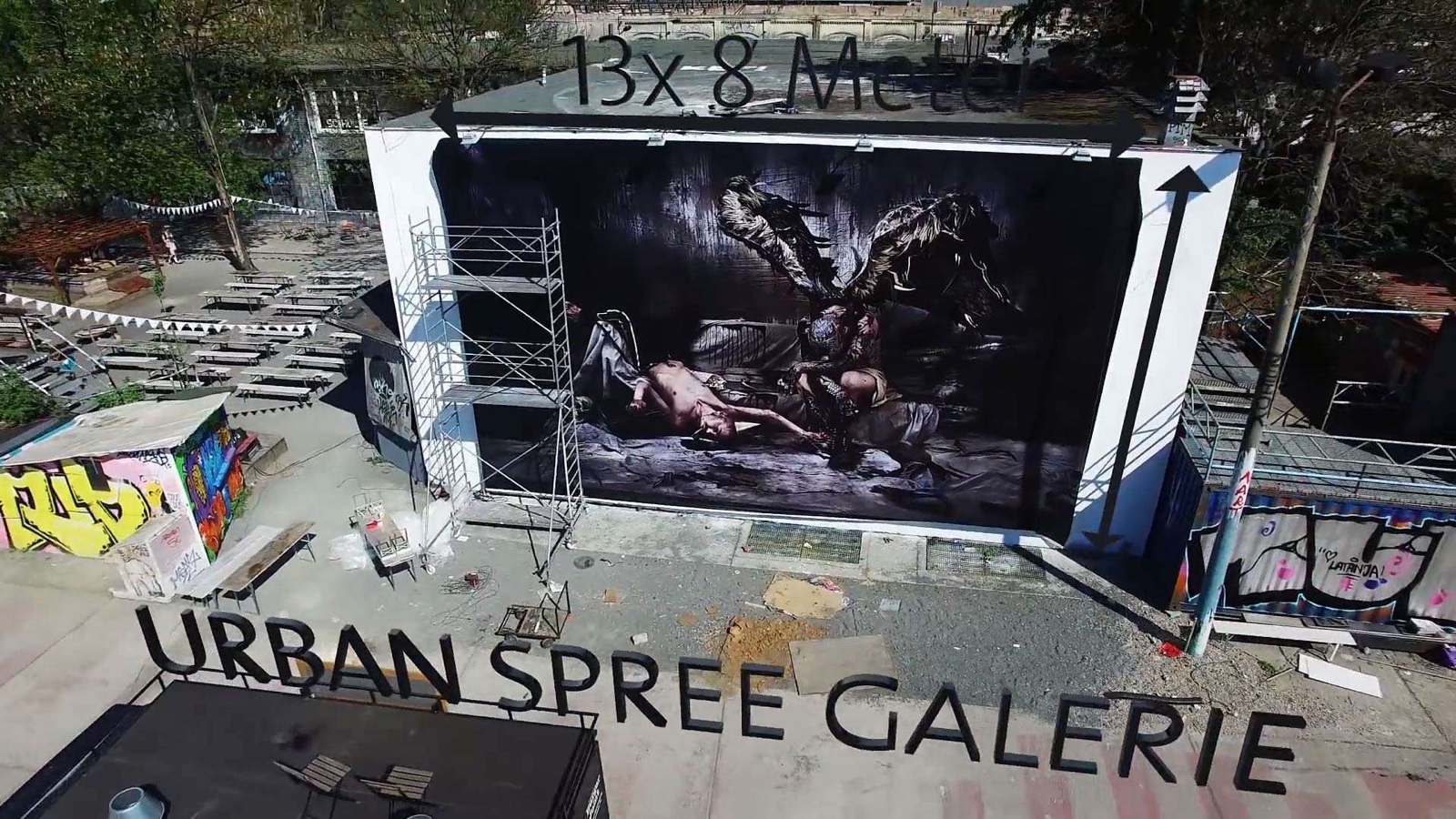 Gérard Rancinan’s large-format photograph ‘The Party Is Over’ animated by projection mapping at Urban Spree Gallery Berlin