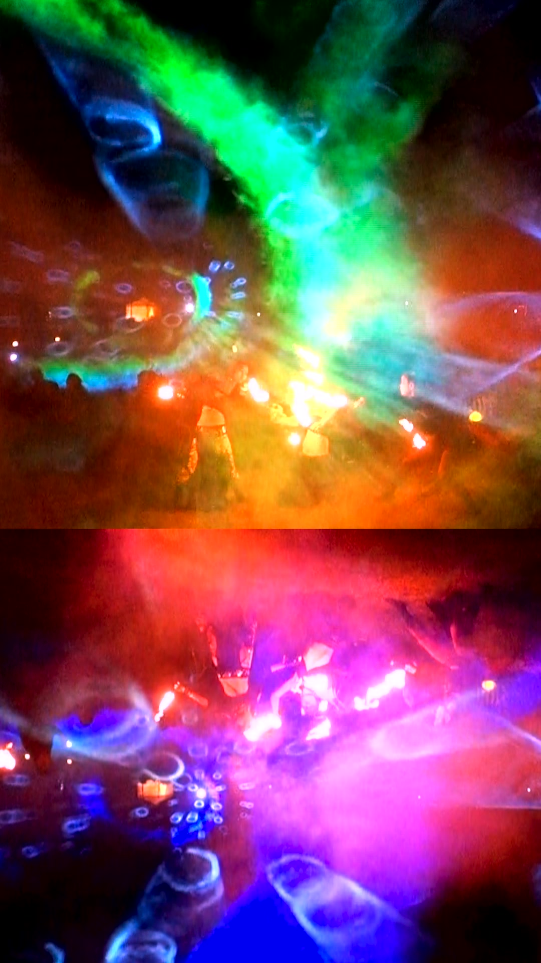 A person standing inside a bright blue holographic light field in fog at night at Re:birth Festival in Japan