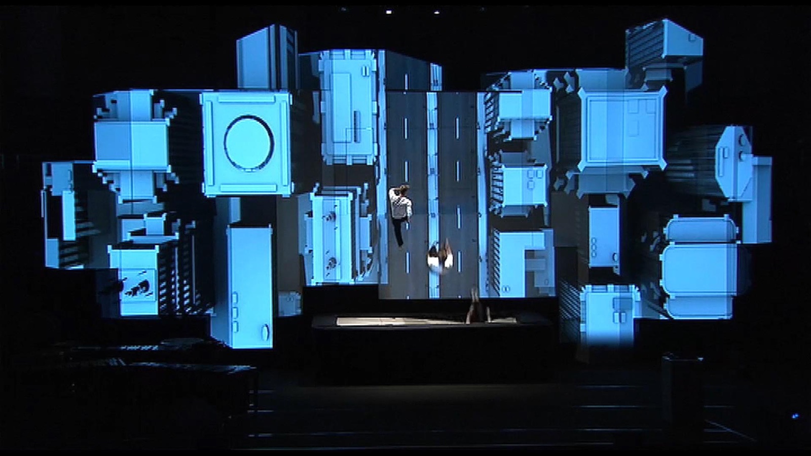 Still from the RE:SORB showreel showing the colourful projection-mapped façade of an opera house